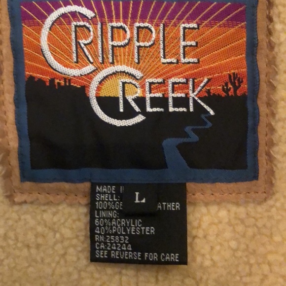 Suede coat with Sherpa like or Sherpa lining. I am not sure. Warm - Picture 9 of 10